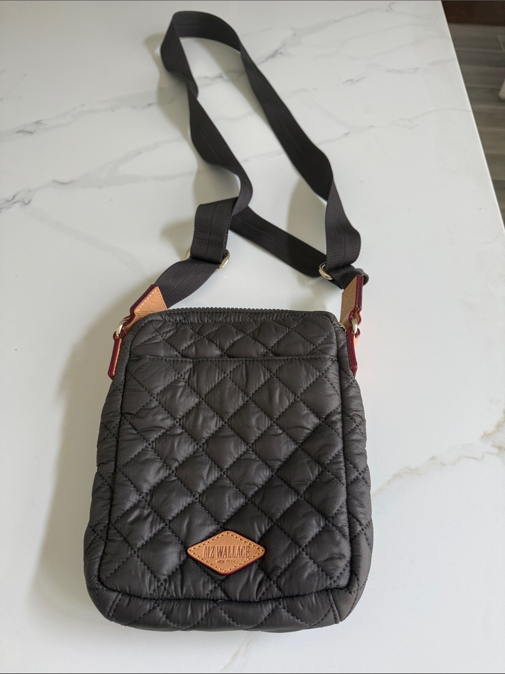 MZ Wallace Black Quilted Crossbody with Tan Leather Patch and Red Accents